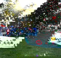 Community Christmas Party and Carols by Candlelight - Pubs Sydney